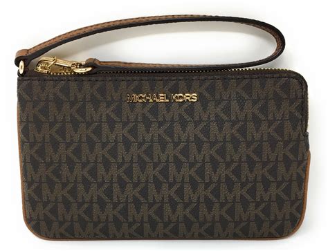 michael kors jet wristlet|michael kors large wristlet clutch.